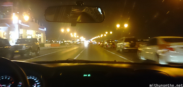 Inside car driving Muscat night
