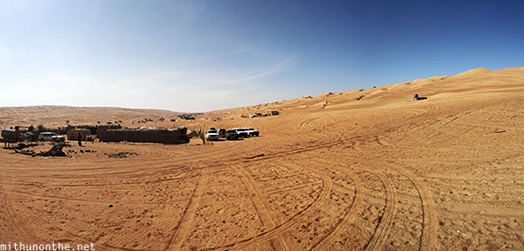 Bedouin tent Oman desert dunes panorama