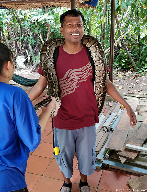 Mithun snake around neck Vietnam