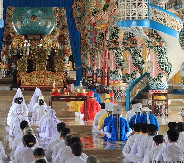 Cao Dai temple prayer