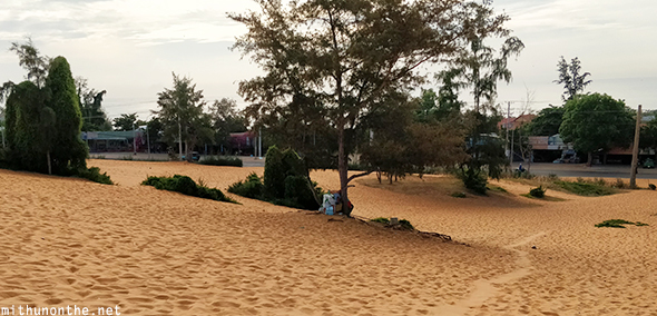Shops near red sand dunes Vietnam