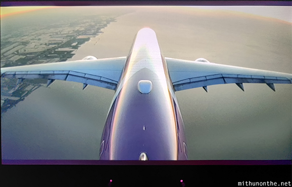 The camera view showed the airplane as it neared Bangkok at sunrise