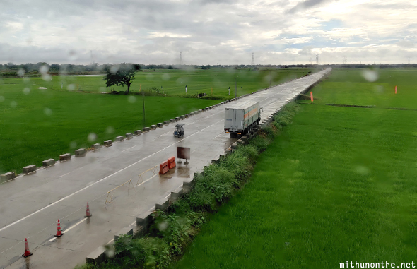 Rainy rice fields highway Philippines