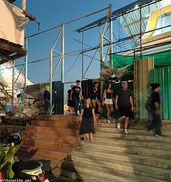 Tourists leaving Wat Arun viewpoint Bangkok