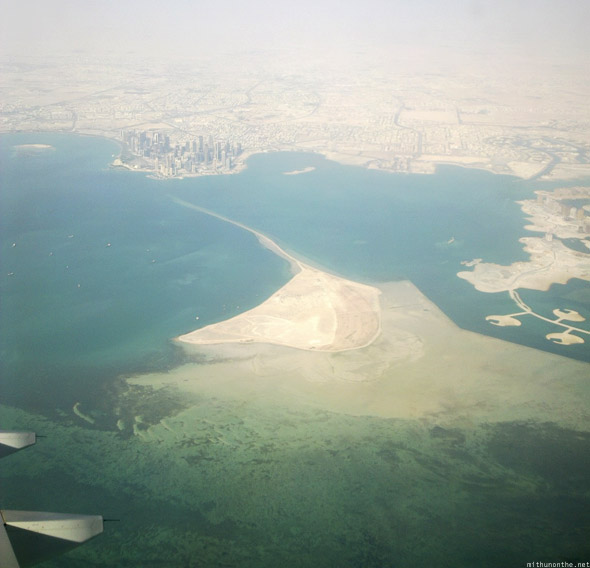 Qatar Airways flying over doha