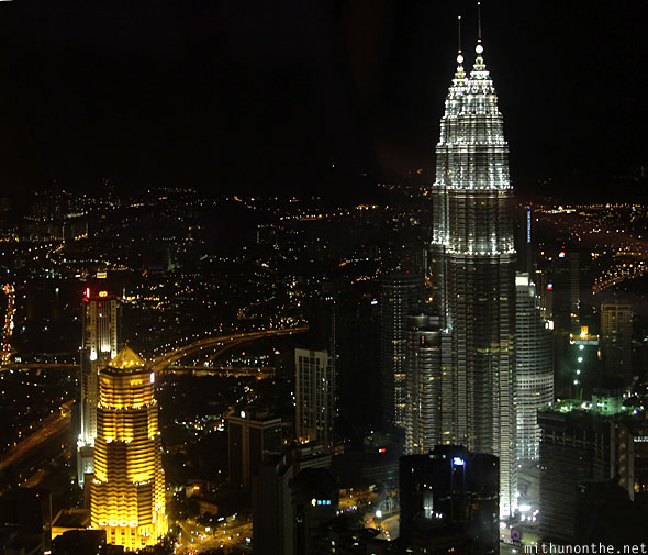 Menara KL tower top view Public Bank Petronas buildings
